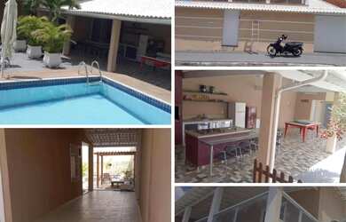 Imagem: A casa possui 5 Dormitórios, 5 Banheiros, 4 Vagas na garagem