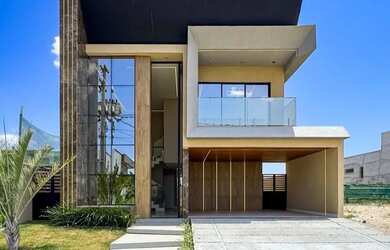 Imagem: A casa em condomínio possui 4 Dormitórios, 5 Banheiros, 4