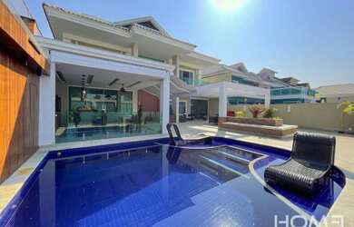 Imagem: A casa em condomínio possui 5 Dormitórios, 5 Banheiros, 2