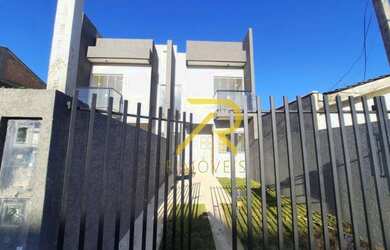 Imagem: A casa possui 2 Dormitórios, 1 Banheiro, 2 Vagas na garagem