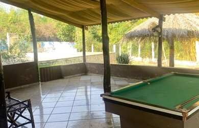 Imagem: A casa possui 3 Dormitórios, 5 Banheiros, 5 Vagas na garagem