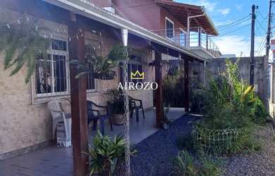 Imagem: A casa possui 3 Dormitórios, 2 Banheiros, 5 Vagas na garagem