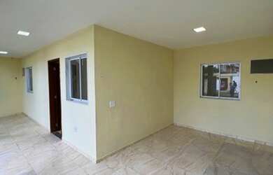 Imagem: A casa possui 2 Dormitórios, 1 Banheiro, 2 Vagas na garagem