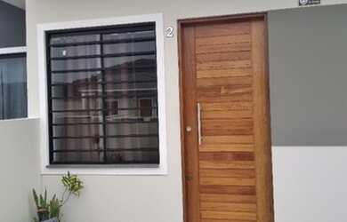 Imagem: A casa possui 2 Dormitórios, 2 Banheiros, 2 Vagas na garagem