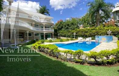 Imagem: A casa em condomínio possui 4 Dormitórios, 5 Banheiros, 5