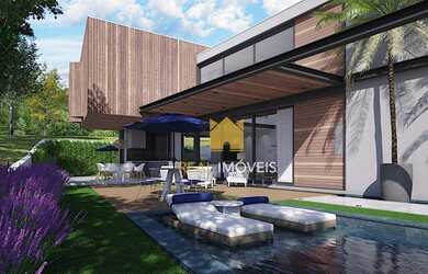 Imagem: A casa em condomínio possui 4 Dormitórios, 5 Banheiros, 5