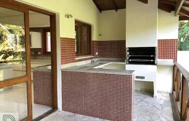 Imagem: A casa em condomínio possui 5 Dormitórios, 5 Banheiros, 5