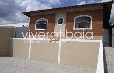 Imagem: A casa possui 3 Dormitórios, 3 Banheiros, 5 Vagas na garagem