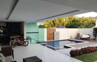 Imagem: A casa em condomínio possui 4 Dormitórios, 5 Banheiros, 2