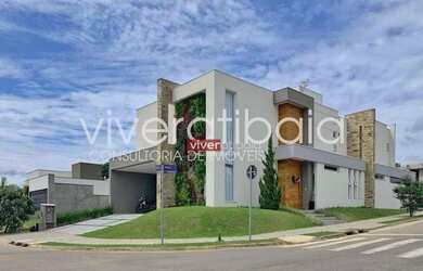 Imagem: A casa à venda possui 4 Dormitórios, 5 Banheiros, 4 Vagas