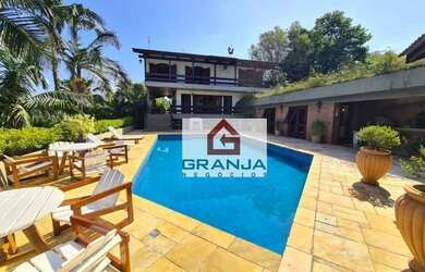 Imagem: A casa em condomínio possui 4 Dormitórios, 4 Banheiros, 5