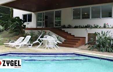 Imagem: A casa em condomínio possui 4 Dormitórios, 5 Banheiros, 4