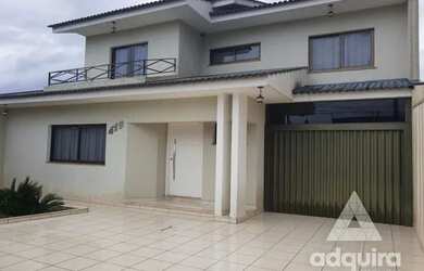 Imagem: A casa possui 2 Dormitórios, 2 Banheiros, 2 Vagas na garagem