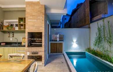 Imagem: A casa em condomínio possui 4 Dormitórios, 4 Banheiros, 2