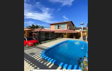 Imagem: A casa possui 5 Dormitórios, 4 Banheiros, 5 Vagas na garagem