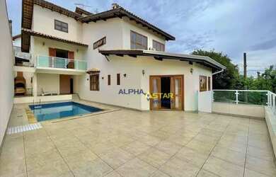 Imagem: A casa em condomínio possui 4 Dormitórios, 5 Banheiros, 5