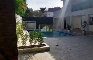 Imagem: A casa em condomínio possui 5 Dormitórios, 5 Banheiros, 5