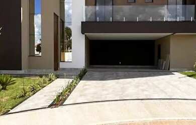 Imagem: A casa em condomínio possui 4 Dormitórios, 5 Banheiros, 3