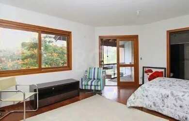 Imagem 9: Casa em Porto Alegre, no bairro Hípica, com 3 dormitório s , e 3 banheiros,...