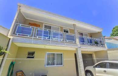 Imagem: A casa possui 3 Dormitórios, 3 Banheiros, 3 Vagas na garagem