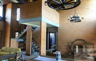 Imagem: A casa em condomínio possui 3 Dormitórios, 3 Banheiros, 250m²