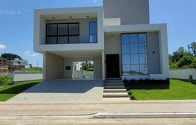 Imagem: A casa possui 3 Dormitórios, 3 Banheiros, 2 Vagas na garagem