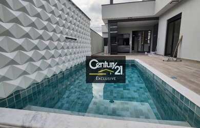 Imagem: A casa em condomínio possui 3 Dormitórios, 4 Banheiros, 4