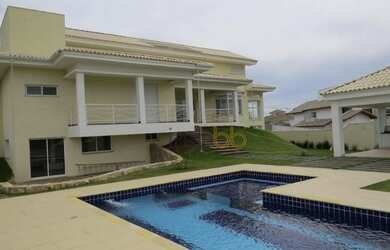 Imagem: A casa em condomínio possui 5 Dormitórios, 5 Banheiros, 5