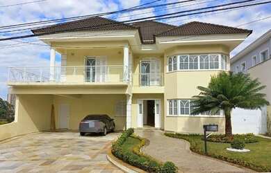 Imagem: A casa em condomínio possui 4 Dormitórios, 5 Banheiros, 5