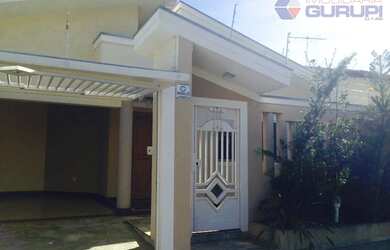 Imagem: A casa possui 3 Dormitórios, 2 Banheiros, 4 Vagas na garagem