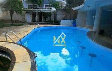 Imagem: A casa possui 5 Dormitórios, 5 Banheiros, 400m² de Área e