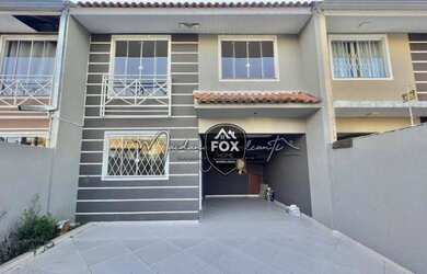 Imagem: A casa possui 3 Dormitórios, 2 Banheiros, 2 Vagas na garagem