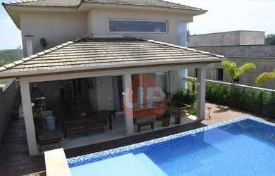 Imagem: A casa em condomínio possui 4 Dormitórios, 5 Banheiros, 4