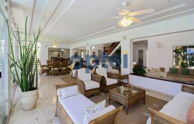 Imagem: A casa possui 5 Dormitórios, 5 Banheiros, 5 Vagas na garagem