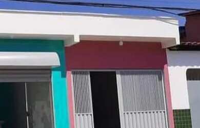 Imagem: A casa possui 3 Dormitórios, 2 Banheiros, 3 Vagas na garagem