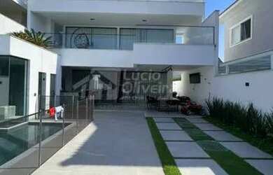 Imagem: A casa em condomínio possui 3 Dormitórios, 3 Banheiros, 500m²