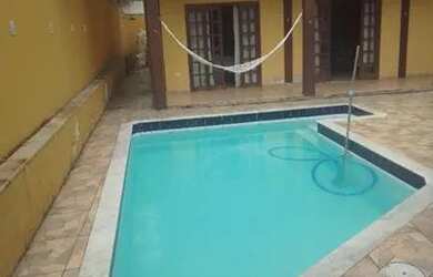 Imagem: A casa possui 4 Dormitórios, 5 Vagas na garagem e está localizado