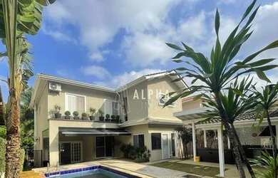 Imagem: A casa em condomínio possui 4 Dormitórios, 4 Banheiros, 4