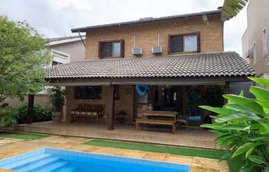 Imagem: A casa em condomínio possui 4 Dormitórios, 4 Banheiros, 2