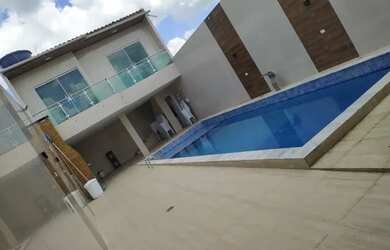 Imagem: A casa possui 2 Dormitórios, 3 Banheiros, 3 Vagas na garagem