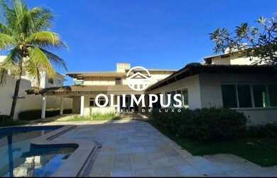 Imagem: A casa possui 4 Dormitórios, 5 Banheiros, 4 Vagas na garagem