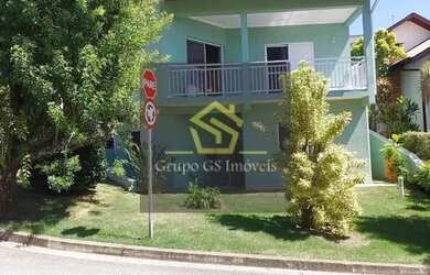 Imagem: A casa possui 3 Dormitórios, 3 Banheiros, 4 Vagas na garagem