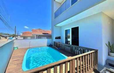 Imagem: A casa possui 2 Dormitórios, 2 Banheiros, 2 Vagas na garagem