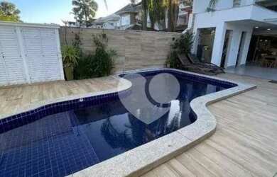 Imagem: A casa em condomínio possui 4 Dormitórios, 5 Banheiros, 5