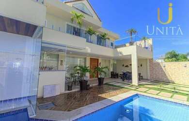 Imagem: A casa em condomínio possui 5 Dormitórios, 5 Banheiros, 2