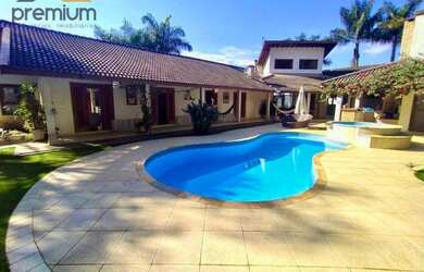 Imagem: A casa em condomínio possui 4 Dormitórios, 5 Banheiros, 5