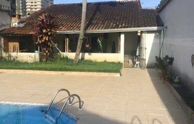 Imagem: A casa possui 3 Dormitórios, 4 Banheiros, 3 Vagas na garagem