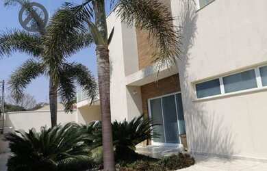 Imagem: A casa possui 5 Dormitórios, 5 Banheiros, 5 Vagas na garagem