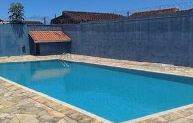 Imagem: A casa possui 2 Dormitórios, 1 Banheiro, 1 Vaga na garagem