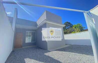 Imagem: A casa possui 3 Dormitórios, 2 Banheiros, 2 Vagas na garagem